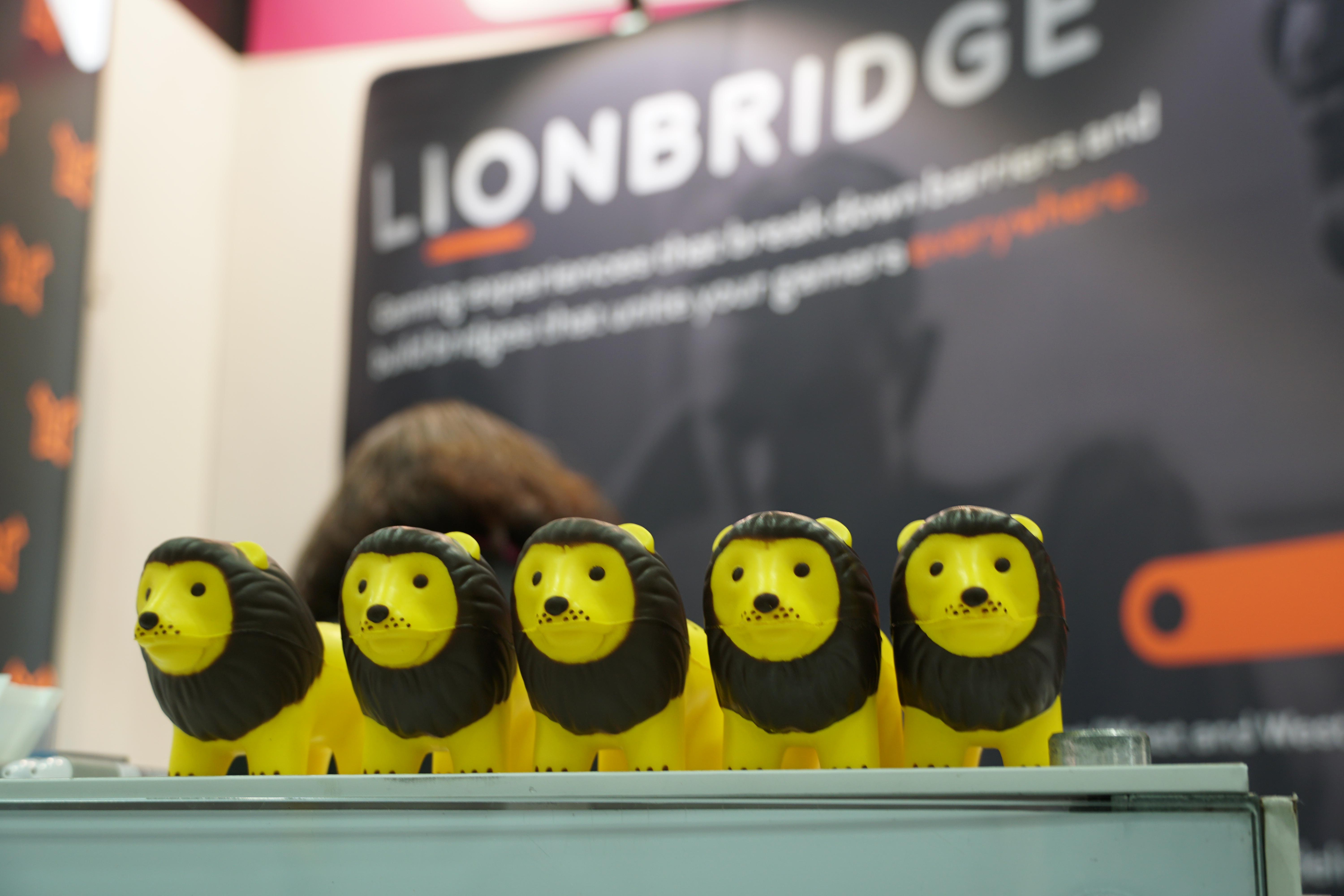 A row of lion-shaped stress balls wait for new homes at G-STAR, just as our Lions are poised to help the global gaming community.