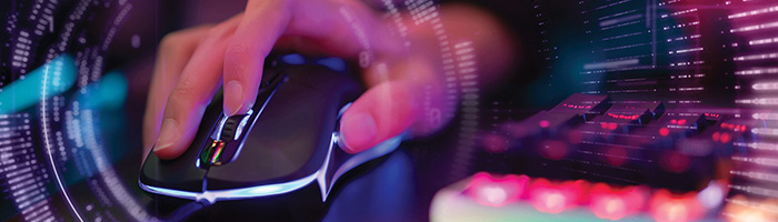 a gamer holding a mouse